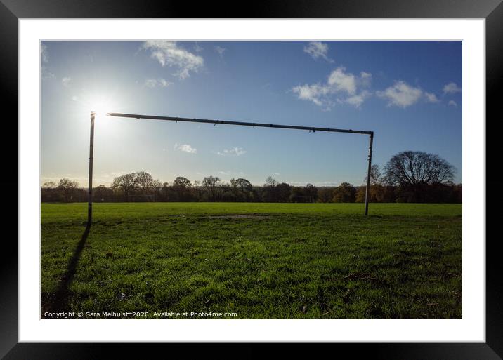 Goalposts on outdoor field Framed Mounted Print by Sara Melhuish
