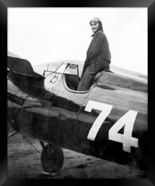 Female aviator in her racing machine. Framed Print by Chris Langley