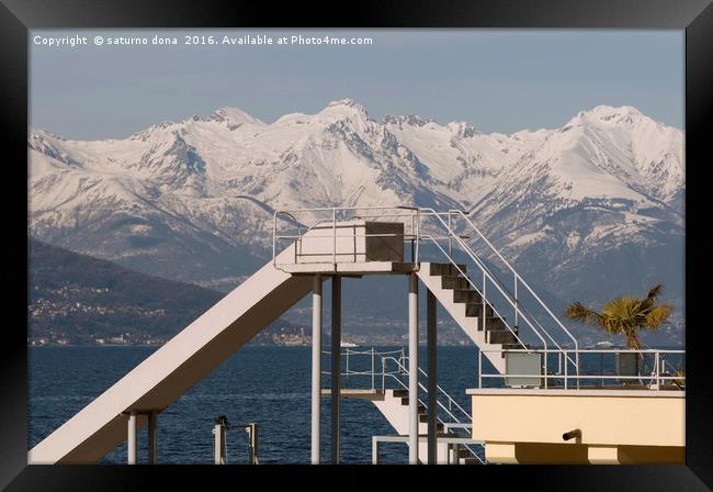Diving board and slide Bellagio Lake Como Italy Framed Print by saturno dona