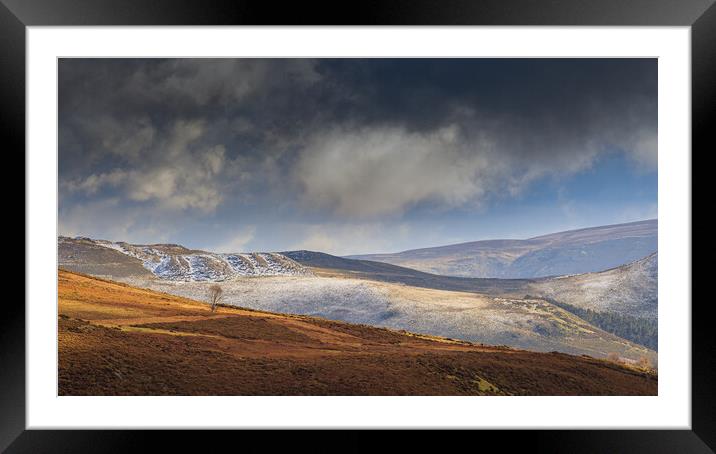 Snow showers Framed Mounted Print by Clive Ashton