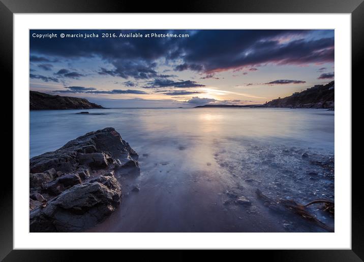 Sunset at rocky beach with slow motion blur water Framed Mounted Print by marcin jucha