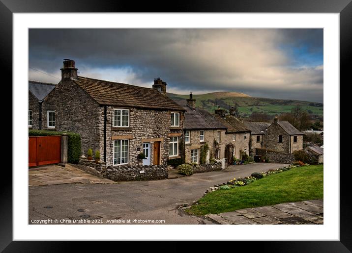 Castleton under stormy clouds Framed Mounted Print by Chris Drabble