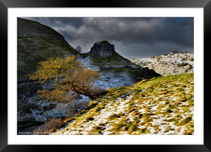 Peter's Stone in the shadow of a low Winter's sun Framed Mounted Print by Chris Drabble