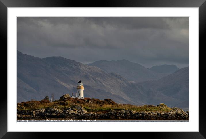 Dark clouds over Isleornsay Lighthouse Framed Mounted Print by Chris Drabble