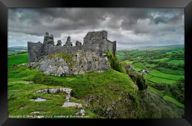 Carreg Cennen Castle with moody clouds Framed Print by Chris Drabble
