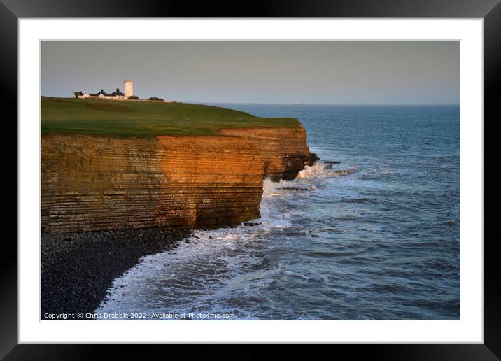 Nash Point and Lighthouse at sunset Framed Mounted Print by Chris Drabble