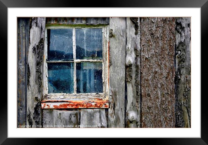 Window and timber Framed Mounted Print by Chris Drabble
