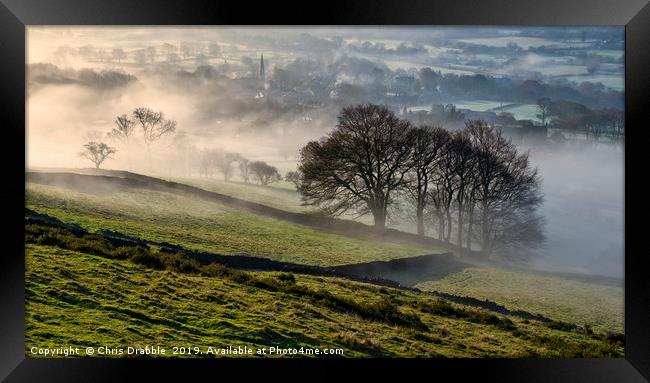 Bamford village shrouded in a mist inversion Framed Print by Chris Drabble