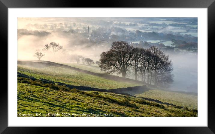Bamford village shrouded in a mist inversion Framed Mounted Print by Chris Drabble