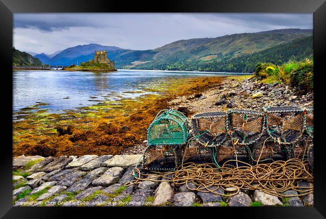 Eilean Donan Castle at dusk Framed Print by Chris Drabble