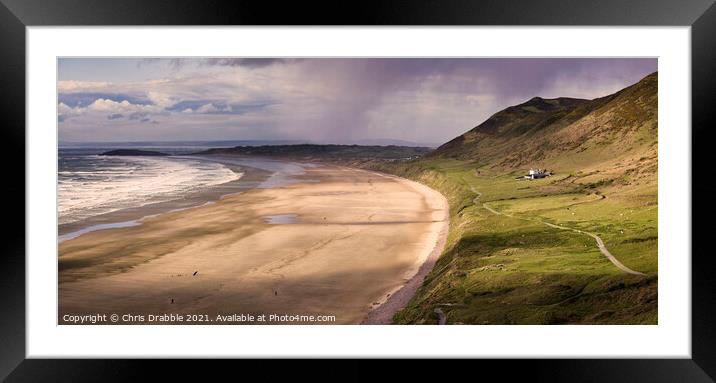 Rossili Bay with rain moving through. Framed Mounted Print by Chris Drabble
