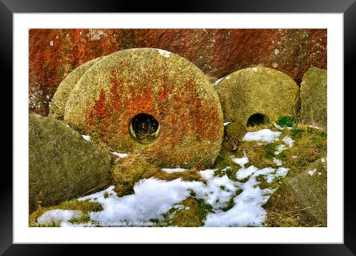 Abandoned millstones Framed Mounted Print by Chris Drabble