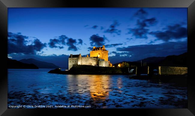 Eilean Donan Castle at dusk Framed Print by Chris Drabble
