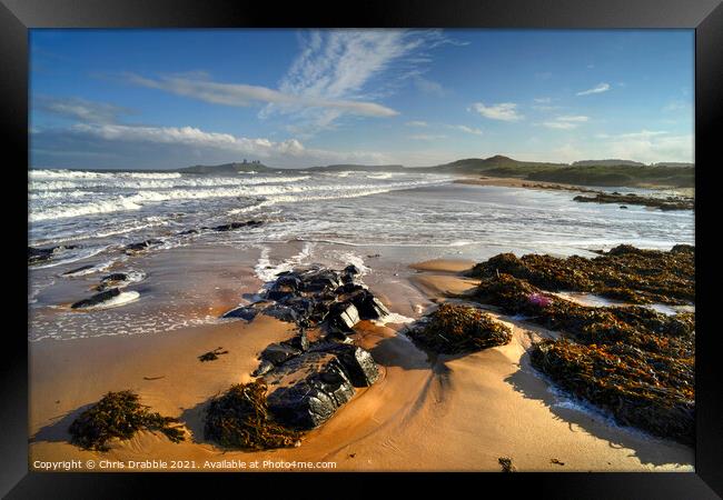 Dunstanburgh Castle from Embleton beach Framed Print by Chris Drabble