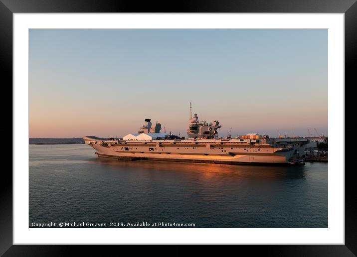 HMS Queen Elizabeth in Portsmouth at sunset Framed Mounted Print by Michael Greaves