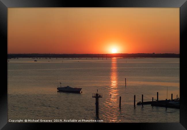 Sunset in Portsmouth harbour Framed Print by Michael Greaves