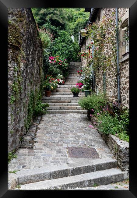 Steps in the medieval town of Dinan Framed Print by Michael Greaves