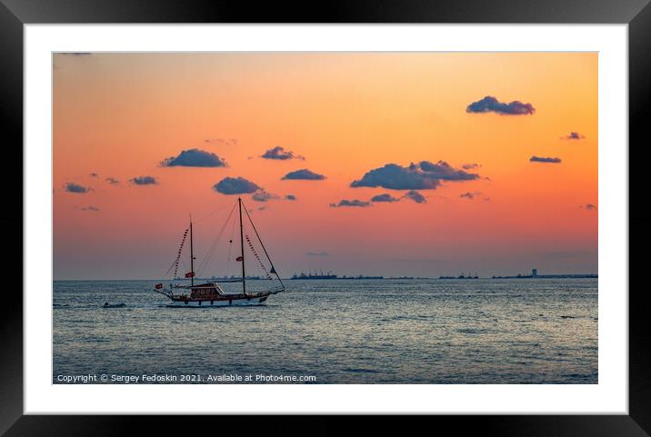 Sailing yacht in Marmara sea. Sunset time Framed Mounted Print by Sergey Fedoskin