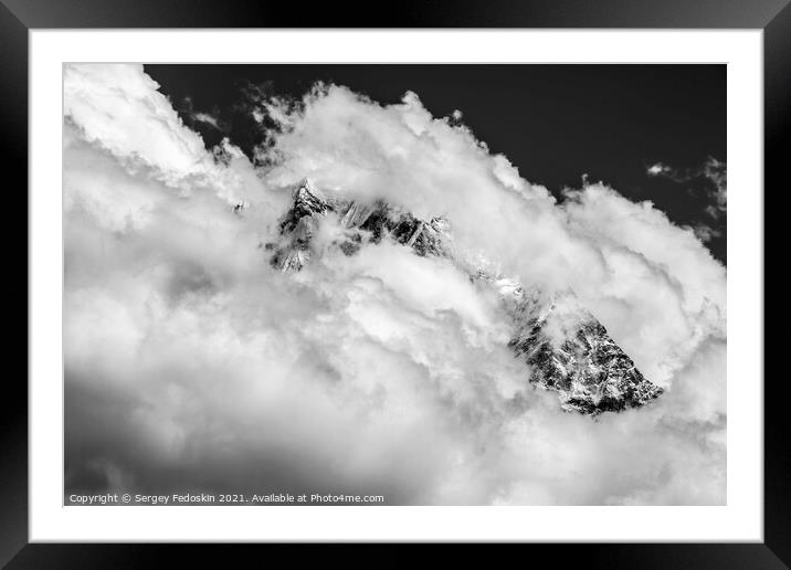 Himalayas covered by snow and clouds. Framed Mounted Print by Sergey Fedoskin
