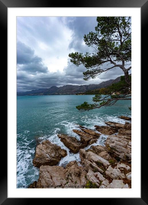 Cloudy weather over the Adriatic coast. Croatia  Framed Mounted Print by Sergey Fedoskin