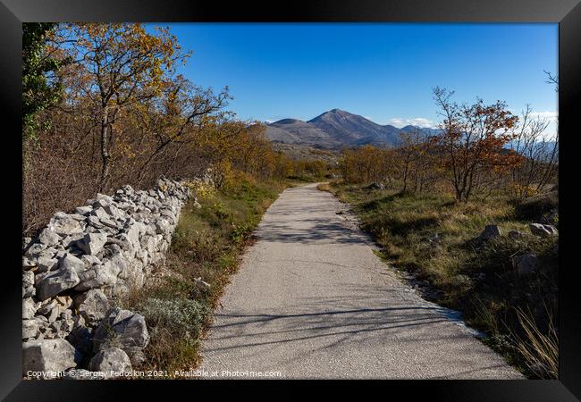 Countryside road in Croatian mountains. Balkans. Framed Print by Sergey Fedoskin