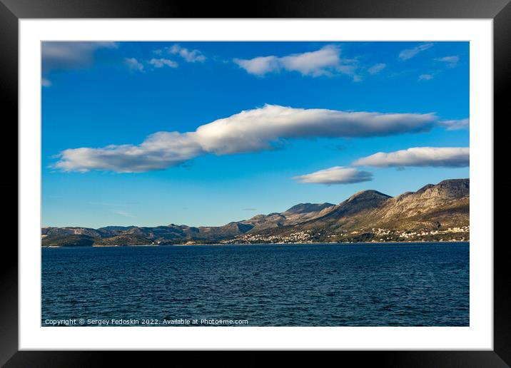 Blue sky over mountains on adriatic coast Framed Mounted Print by Sergey Fedoskin