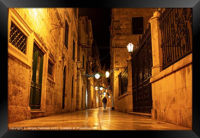 Night view of a narrow street in the historical center of Dubrovnik, Croatia Framed Print by Sergey Fedoskin