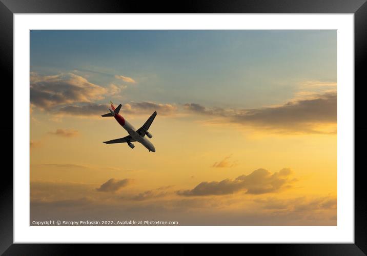 Passenger plane in the blue sky - Air travel. Framed Mounted Print by Sergey Fedoskin