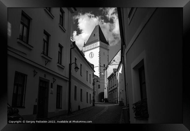 Medieval street with historical buildings, gothic clock tower of Town hall. Tabor, South Bohemia, Czech Republic. Framed Print by Sergey Fedoskin
