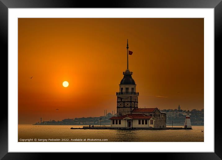 Maiden Tower (Kiz Kulesi) in Istanbul in the evening with sunset sky. Bosporus strait. Framed Mounted Print by Sergey Fedoskin