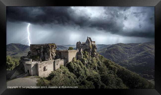 Thunderstorm with lightning over Aggstein castle.  Framed Print by Sergey Fedoskin