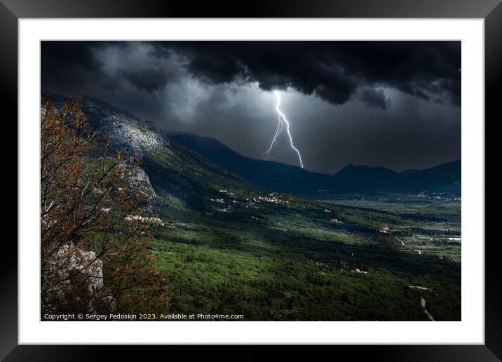 Lightning strike in the mountains. Framed Mounted Print by Sergey Fedoskin