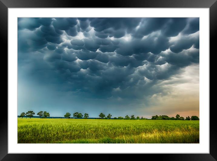 Mammatus clouds fill the sky. Framed Mounted Print by Sergey Fedoskin