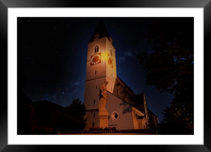 A clock tower lit up at night. Spitz village. Wachau valley. Austria. Framed Mounted Print by Sergey Fedoskin