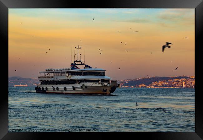Cruise ferries in Bosphorus between european and asian coasts of Framed Print by Sergey Fedoskin
