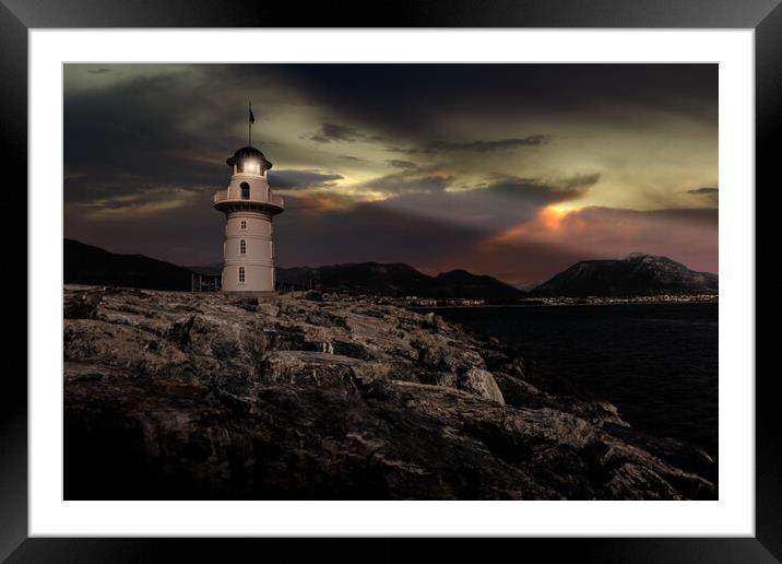 Lighthouse on a mediterranean coast at night. Framed Mounted Print by Sergey Fedoskin