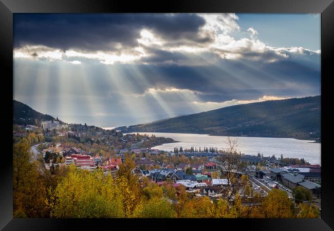 Sun rays above Åre in Sweden Framed Print by Hamperium Photography