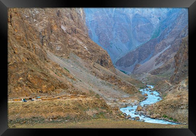 Mountain landscape along the river border of Tajikistan and Afg Framed Print by Tartalja 
