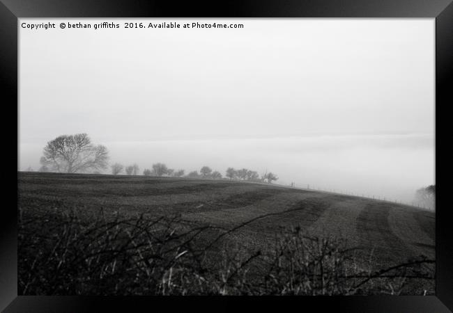 Mist over rolling hills of Laugharne  Framed Print by bethan griffiths