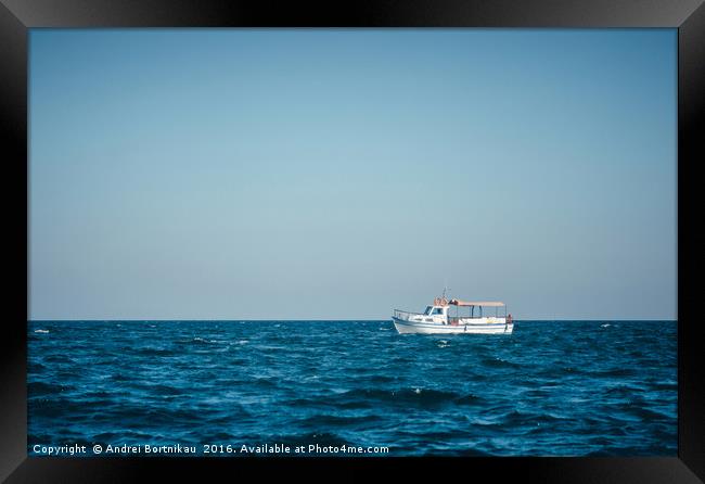 Lonely tourist boat in the Black Sea without peopl Framed Print by Andrei Bortnikau