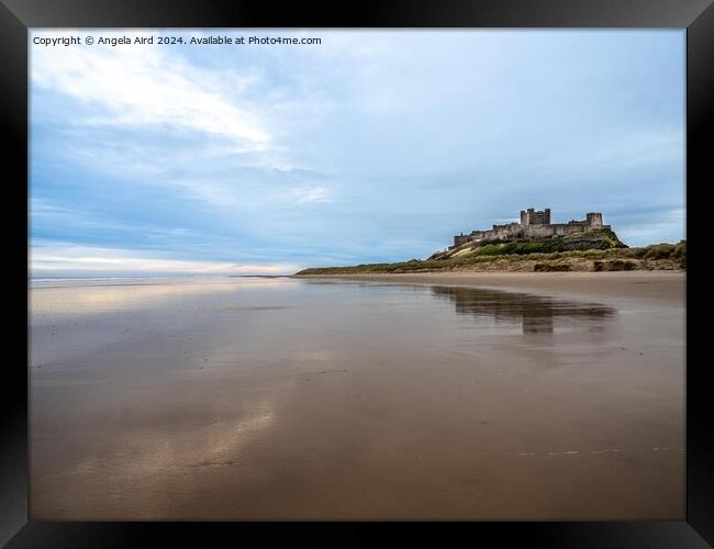 Bamburgh Castle. Framed Print by Angela Aird