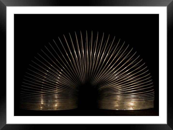 Slinky. Framed Mounted Print by Angela Aird