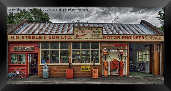 Old village garage. Framed Print by Angela Aird