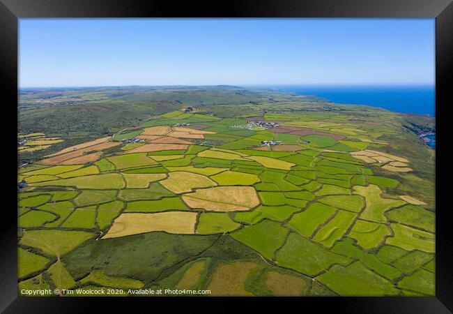 Aerial photograph of a patchwork of farmers fields near St Ives Framed Print by Tim Woolcock