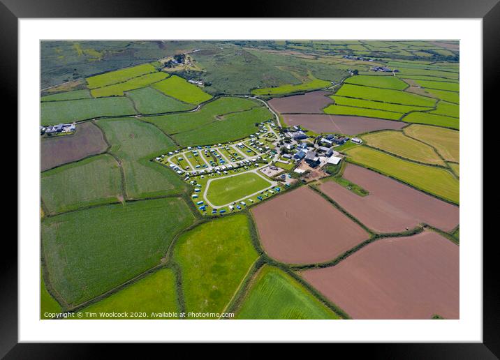 Aerial photograph of a patchwork of farmers fields near St Ives Framed Mounted Print by Tim Woolcock