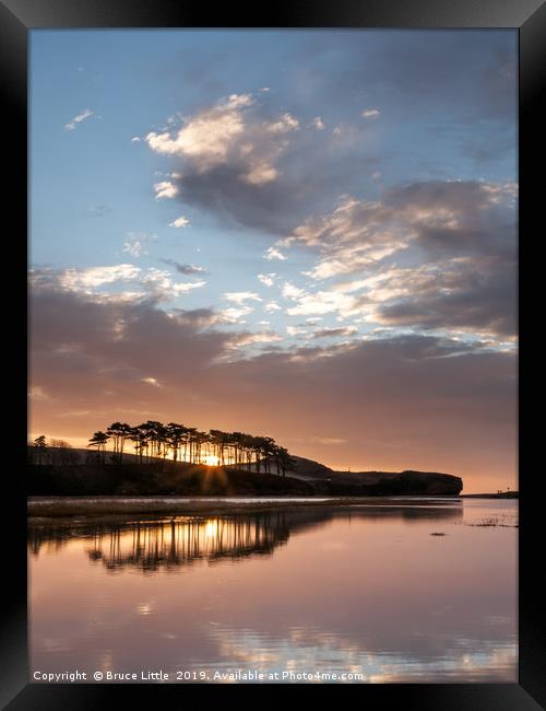 Sunrise Silhouettes Framed Print by Bruce Little