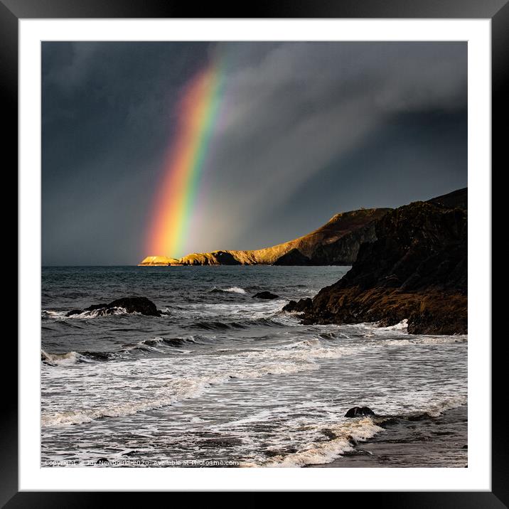 Rainbow light on headland at Cardigan Bay Framed Mounted Print by Joy Newbould