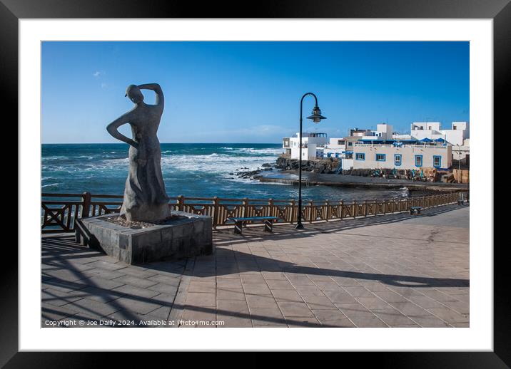 Fishermans wife Statue El Cotillo Fuertaventura  Framed Mounted Print by Joe Dailly