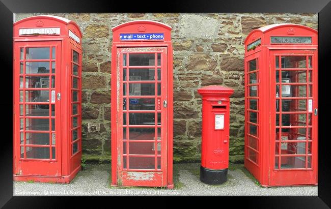 Iconic red telephone boxes with an iconic red post Framed Print by Rhonda Surman