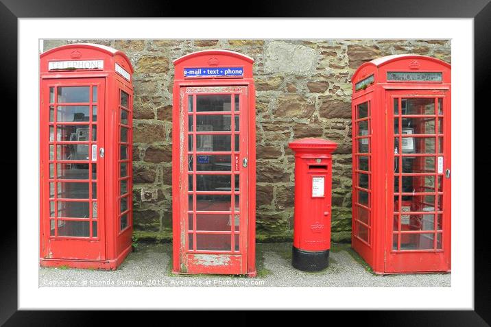Iconic red telephone boxes with an iconic red post Framed Mounted Print by Rhonda Surman